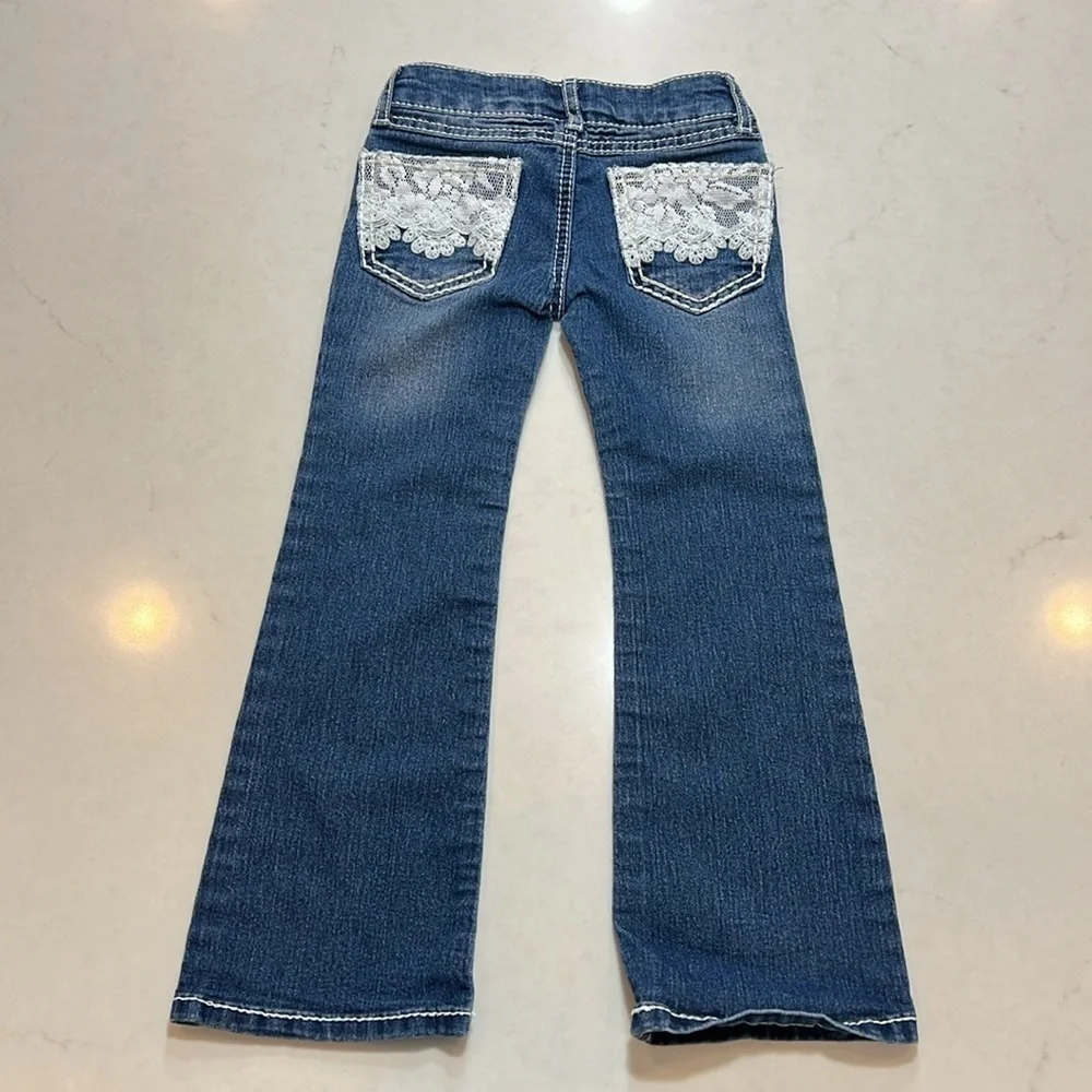 Faded glory girls jeans, size 4, never worn.